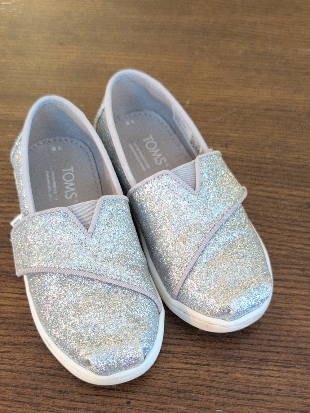 Toms Kids Silver Glitter Slip-On Sneakers